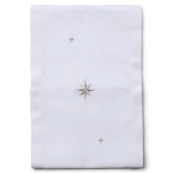 White table runner with embroidered silver stars